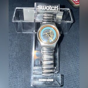 Swiss Made Swatch Watch with Blue Dial Accent and Silver bracelet Blade Runner
